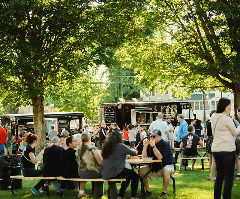 People eating at Food Truck Friday