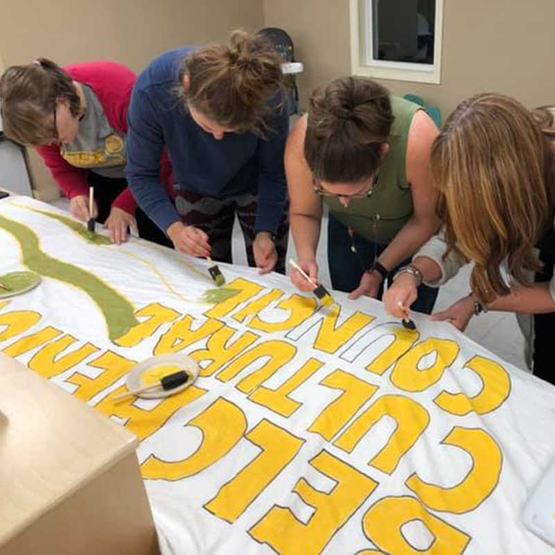 BCC members painting our parade banner